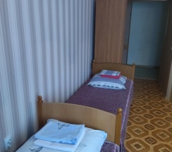 4-местный номер стандарт улучшенный с 4 односпальными кроватями в Космос