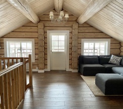 Коричневый дом с видом на озеро в Forrest Lodge Karelia