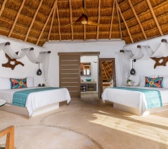 Номер Plunge Pool oceanfront в Shangri-la Caribe Beach Village Resort