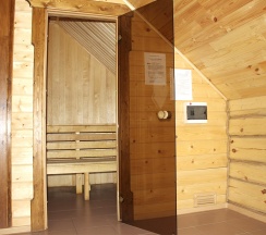 Двуместный номер в деревянном коттедже с cауной в Колыба