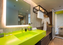 Номер Deluxe в Maitria Rama 9 Bangkok - A Chatrium Collection Hotel