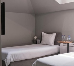 Двухместный номер Мансардный двуспальная кровать в Sapiens Hotel