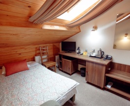 Стандарт мансардный одноместный в Алеша Попович Двор&Лукоморье