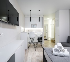 Двухместная студия Deluxe с балконом двуспальная кровать в Апартаменты Новая в Престижном ЖК Минск-Мир