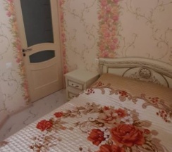 Двухместные апартаменты двуспальная кровать в Марго