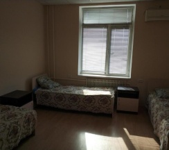 Кровать в общем номере в Әлем