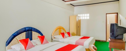 Семейный номер Deluxe в OYO 3899 Penginapan Christina