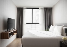 Номер Deluxe c 1 комнатой с балконом в Walton Suites Sukhumvit