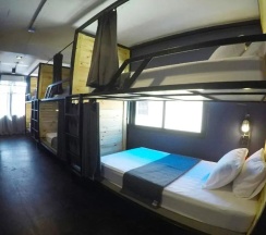 Кровать в общем номере в Bandai Hostel