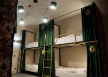 Кровать в общем 8-местном номере для женщин в Guten Duck Moscow