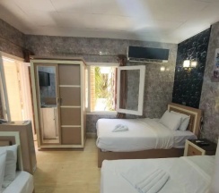Трёхместный номер Comfort с 3 комнатами с видом на город в Отель Cairo