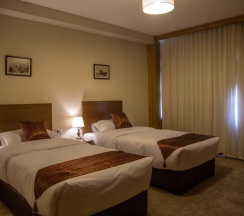 Четырёхместный номер Standard с 2 комнатами с видом на город в Antika Amman Hotel