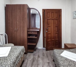 Кровать в 4-местном общем номере в Smart Hotel KDO Миасс