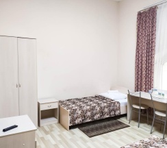 Кровать в 3-местном общем номере в Smart Hotel KDO Саранск