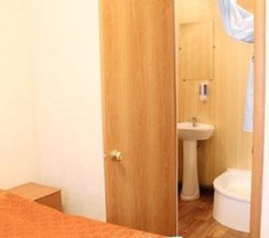 Номер стандарт семейный с 1 двуспальной кроватью в Регион 86