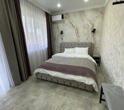 Двухместный номер Standard с балконом двуспальная кровать в Гостевой дом на Октябрьской