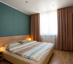 Апартаменты с гостиной и 2 спальнями. Вид на реку Казанку и аквапарк "Ривьера" в Sibgat Apartments