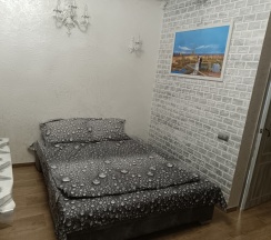 Кровать в общем номере в Компания по посуточной аренде коттеджа