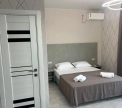 Четырёхместный номер Standard с балконом в Сюзэн