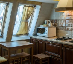Номер стандарт с 1 двуспальной кроватью и кухней в Наташа Ростова