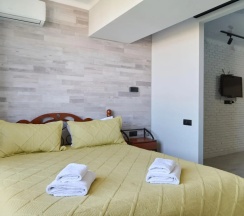 Четырёхместные апартаменты Standard c 1 комнатой в Bg Apartments