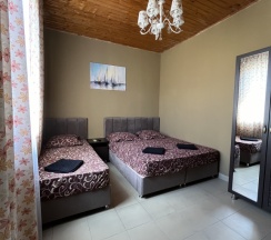 Четырёхместный номер Comfort с балконом в Мандарин