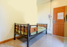 Кровать в общем номере в OYO 928 Leaf Hostel