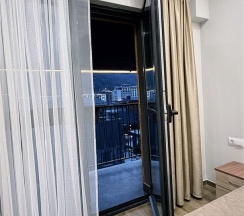 Апартаменты двухкомнатные (ЛЮКС) с балконом и красивым видом в Polikariya