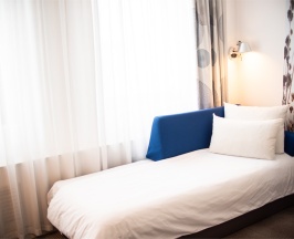 Номер Family с двуспальной кроватью и софой в Novotel Krasnoyarsk center