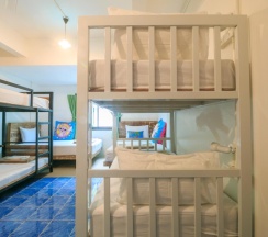 Кровать в общем номере в Frog House Bed & Breakfast