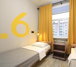 Кровать в общем номере в Арт Хаус