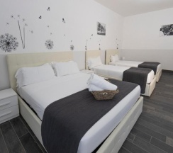 Четырёхместный номер Standard в Arch Rome Suites