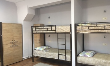 Кровать в 12 местном номере для мужчин в Энергия