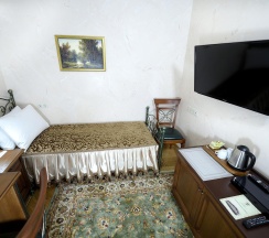 Двухместный номер стандарт первой категории с 2 односпальными кроватями в Покровская