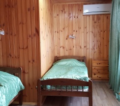 Номер стандарт с 2 односпальными кроватями (с пансионом) в Ольга