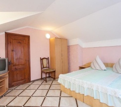 Четырёхместный номер Standard с 2 комнатами с красивым видом из окна в Гостевой дом