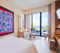 Двухместный Swim Up Adults oceanfront (двуспальная кровать) в Отель Xcaret Mexico	