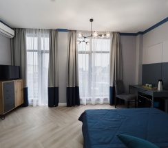 Делюкс с двуспальной кроватью в Душа