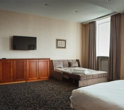 Бизнес класс комфортный с двумя кроватями/ или одной широкой кроватью и диваном-кроватью в Бенефит Плаза