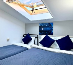 Апартаменты №11 "Семейный Люкс" на мансардном этаже в Саквояж