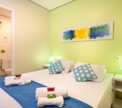 Двухместный люкс двуспальная кровать в Brazilodge All Suites Hostel