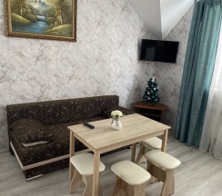 Шестиместный номер Economy с балконом и с красивым видом из окна в Дюна-центр