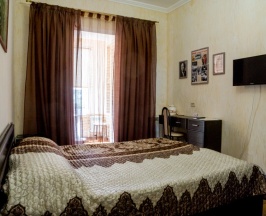 Двухместный номер Superior с балконом и с видом на город двуспальная кровать в Льгов