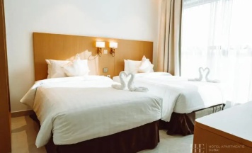Двухместная студия апартаменты Deluxe 2 отдельные кровати в HE Hotel Apartment