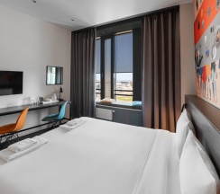 Стандарт с большой кроватью в Delta Sirius