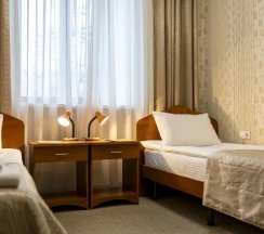Двухместный номер первой категории Стандарт 2 отдельные кровати в Нефтяник