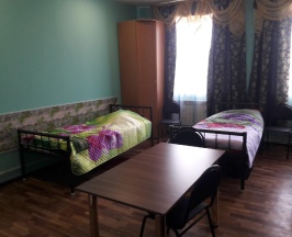 Кровать в 2-местном общем номере в Лесная