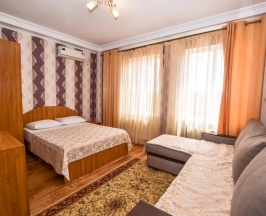 Номер улучшенный семейный в Посейдон