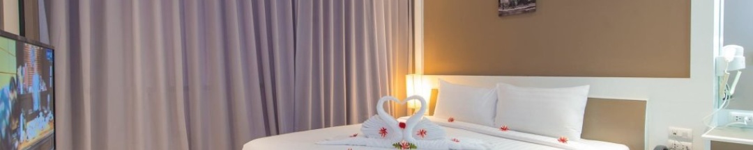 Кровать в общем номере в Sino Maison Hotel