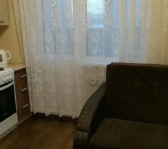 Апартаменты c 1 комнатой с балконом в Квартира на улице Ивана Захарова 12/1